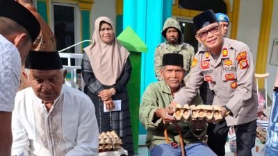 Polres Aceh Tengah Salurkan Bantuan Sembako dalam Program Jumat Berkah di Kampung Bies Baru